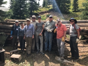 Volunteers at the cabin removal site